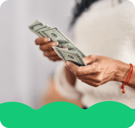 Person waving near the sea